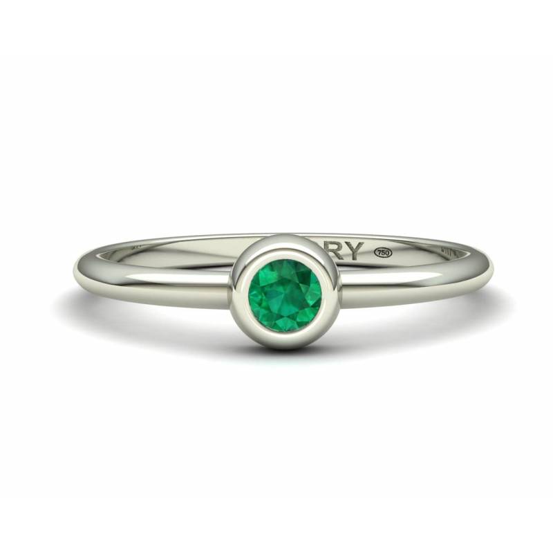 Delicate emerald white gold ring