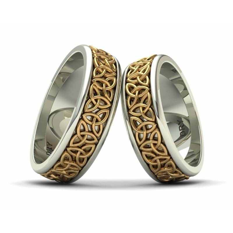 Two-tone gold Triquetra wedding rings